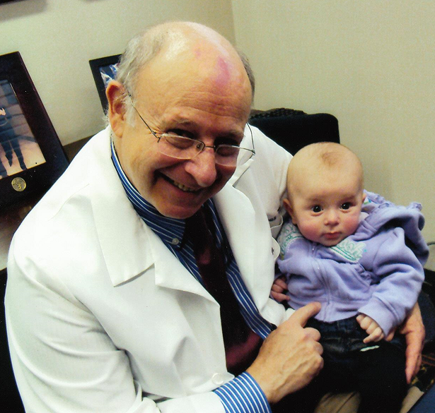 Midwest Fertility Center- Dr Madanes with baby