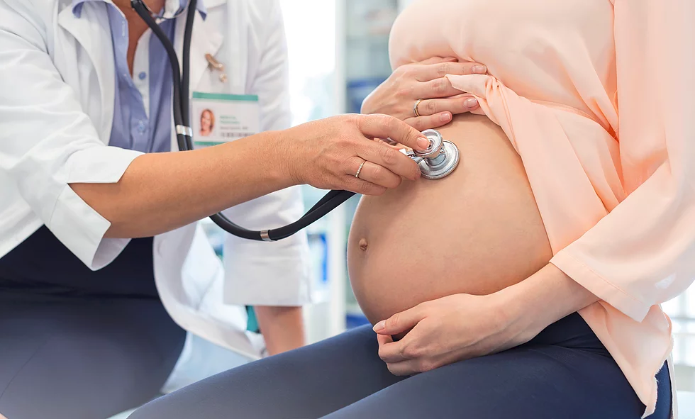 Midwest Fertility Center-doctor, pregnant woman